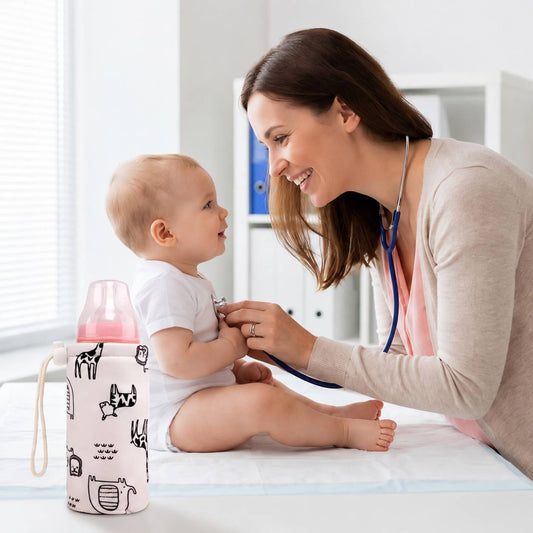 chauffe biberon nomade avec bebe animal noir dans un environnement propre