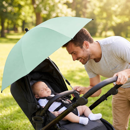 Ombrelle pour poussette protégeant un bébé du soleil pendant une promenade en plein air