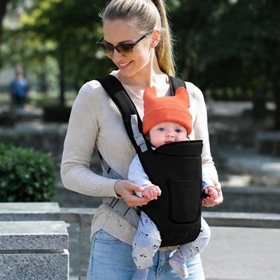 Porte bebe ergonomique assurant un portage stable et confortable lors des balades en famille