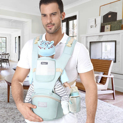 porte bebe ergonomique vert portage avant papa avec ceinture lombaire