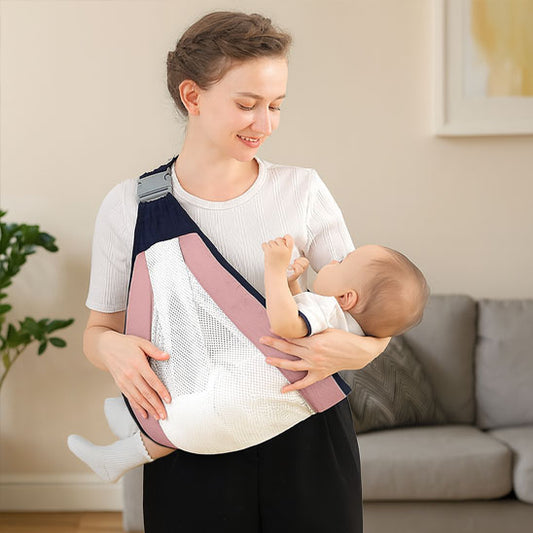 porte bebe hanche bordure rose permettant de porter bebe confortablement contre soi