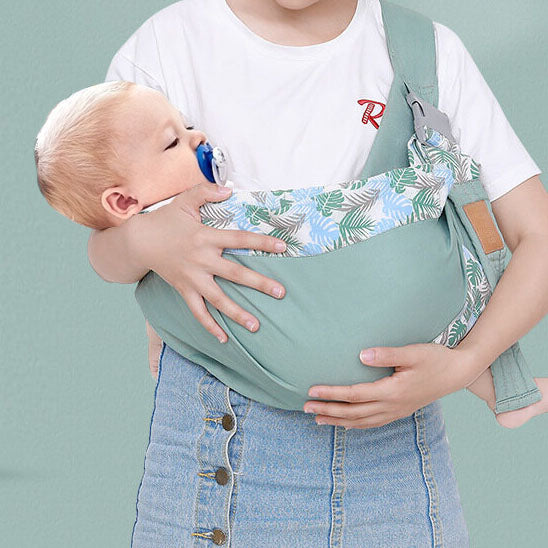 Porte-bébé nouveau-né permettant une position horizontale avec boucle visible