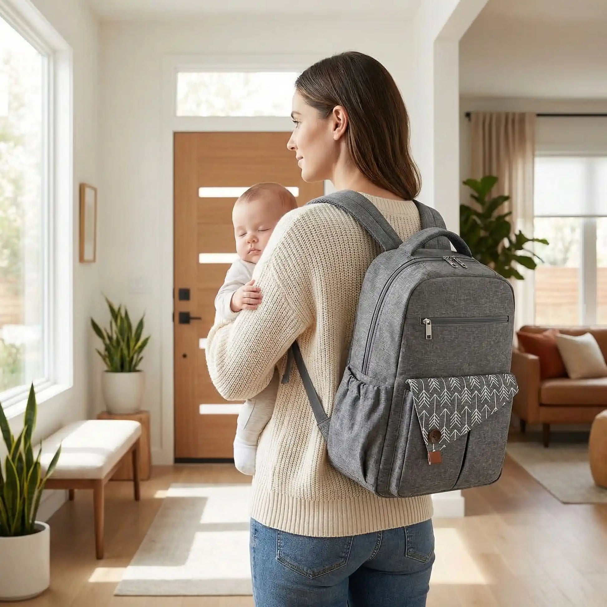 Sac a dos a langer bebe couleur gris porte au dos avant sortie